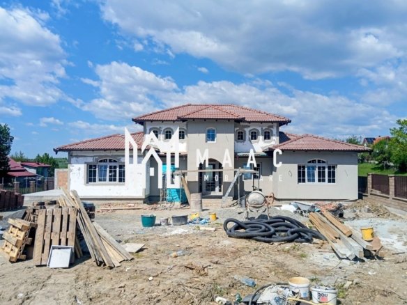 Casa stil mediteranian 4 dormitoare 800 mp teren Tocile Sibiu