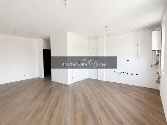 Apartament 3 camere, 2 bai, 71 mp, etaj intermediar, balcon, garaj.