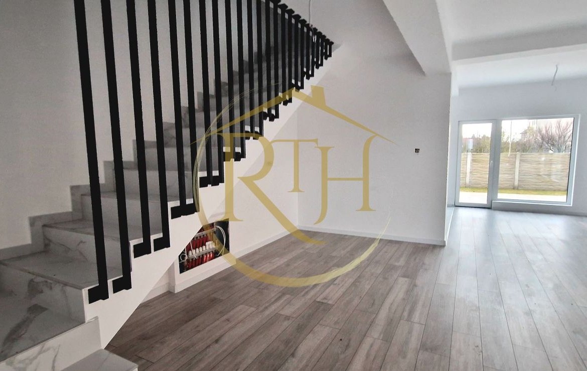 Duplex de vanzare cu 4 camere,2 bai,250 mp teren-Mosnita Veche zona Centrala.