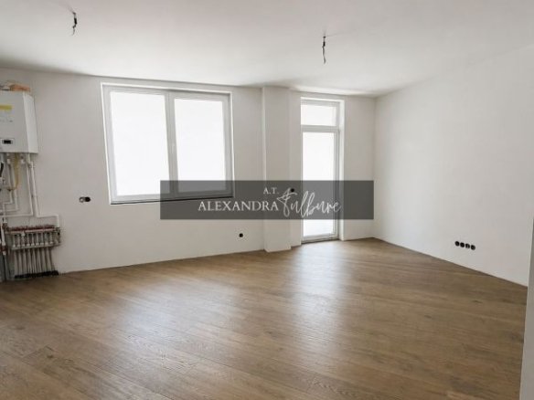 Apartament 3 camere, 2 bai, etaj intermediar, balcon, garaj, boxa