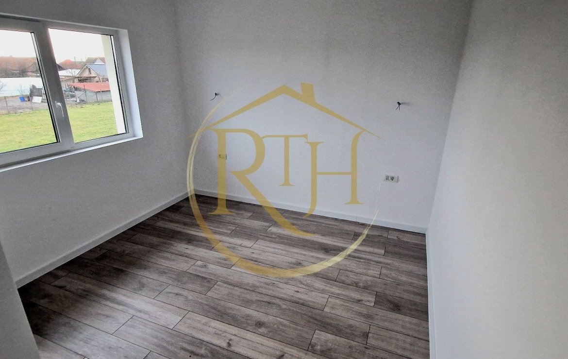 Duplex de vanzare cu 4 camere,2 bai,250 mp teren-Mosnita Veche zona Centrala.