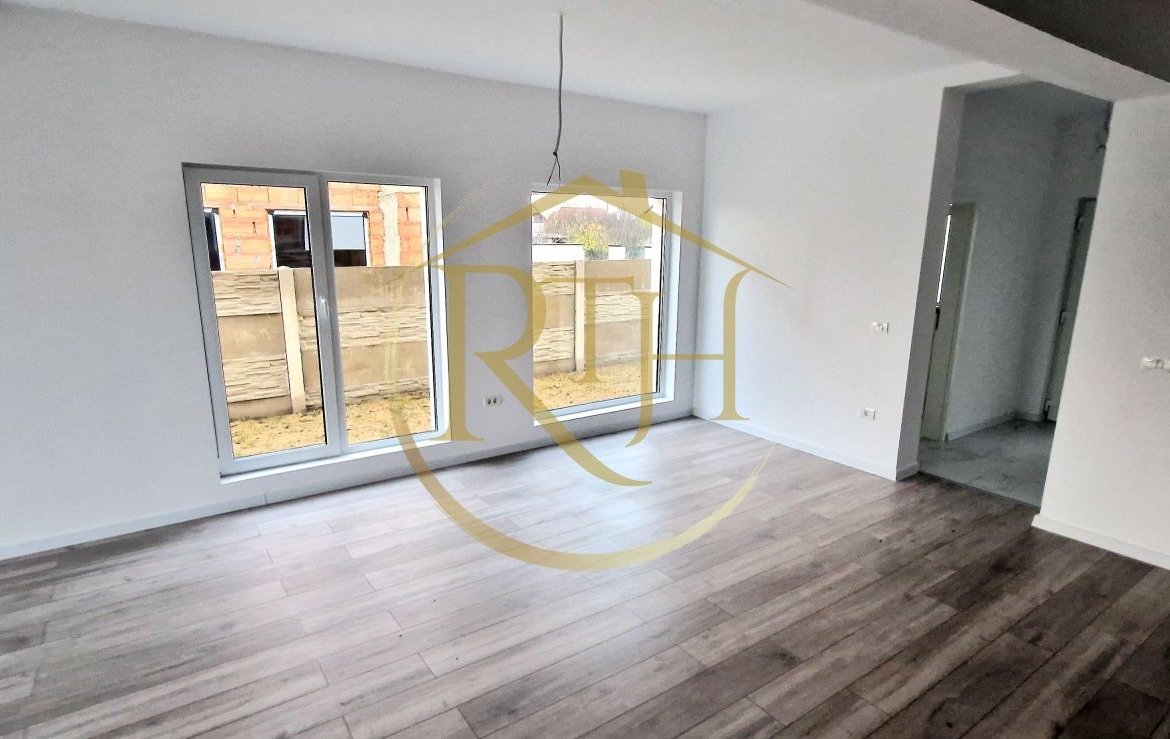 Duplex de vanzare cu 4 camere,2 bai,250 mp teren-Mosnita Veche zona Centrala.