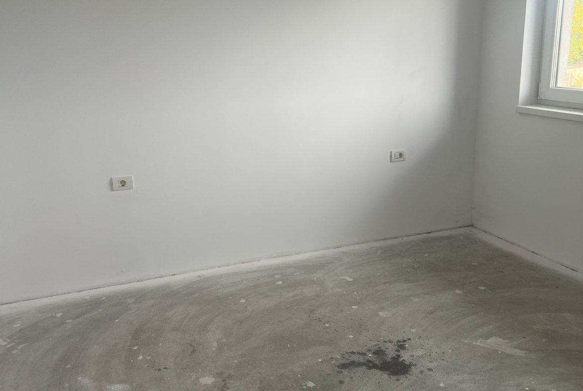 Case înșiruite cu 4 camere, grădină privată și 2 locuri de parcare