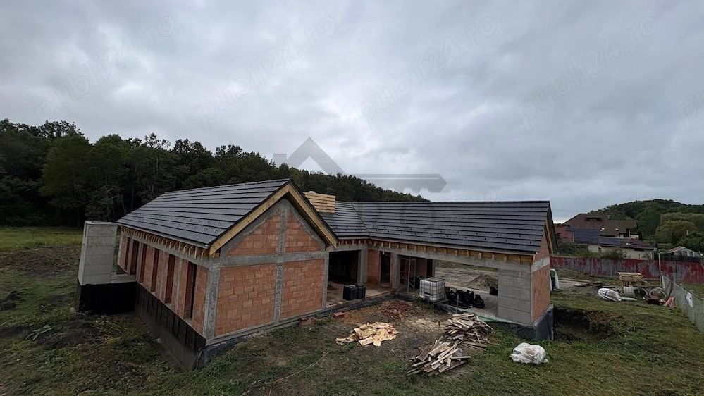 Casa individuala superba, cu arhitectura scandinava, moderna – langa padure, teren generos
