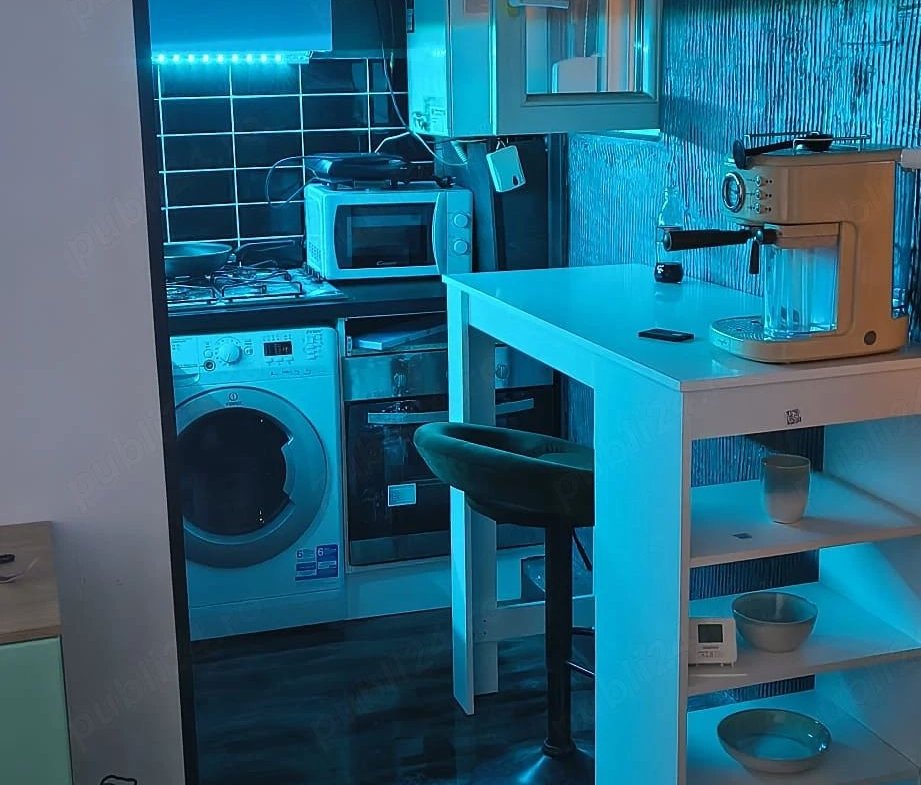 Apartament cu 2 camere, la parter, centrală proprie și aer condiționat