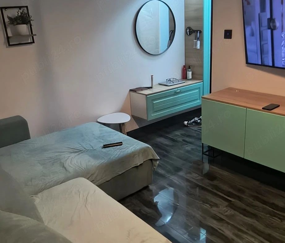 Apartament cu 2 camere, la parter, centrală proprie și aer condiționat